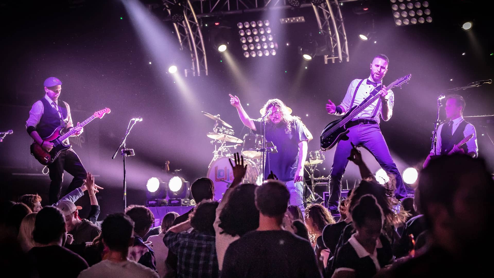 Promotional photo of Lolla performing live